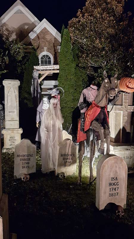 Night View of Front Gate Entrance to Halloween Graveyard Cemetery